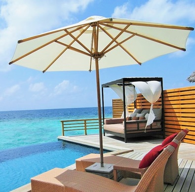 parasol and sunchairs on a beach