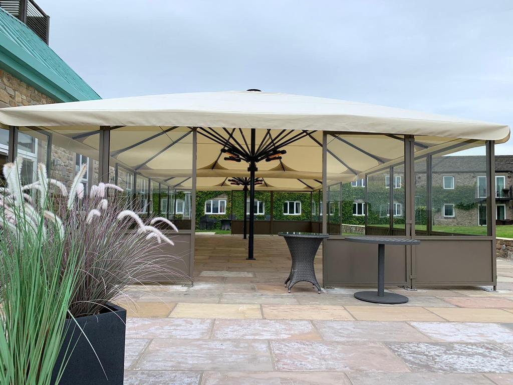 large commercial parasol for restaurant with side screens